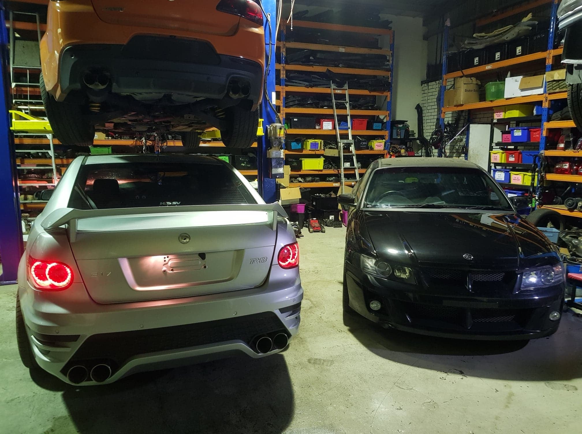 Inside the Northcom workshop — HSV Clubsports on the floor, VF on the hoist